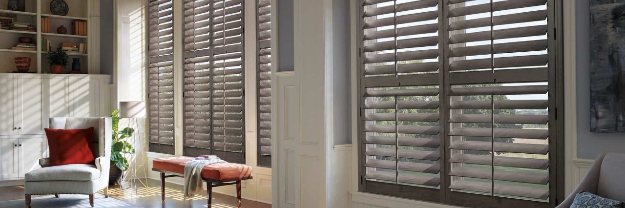 Window treatments near Cape Coral, Florida (FL), that offer rustic looks in the home, including Heritance® Hardwood Shutters.