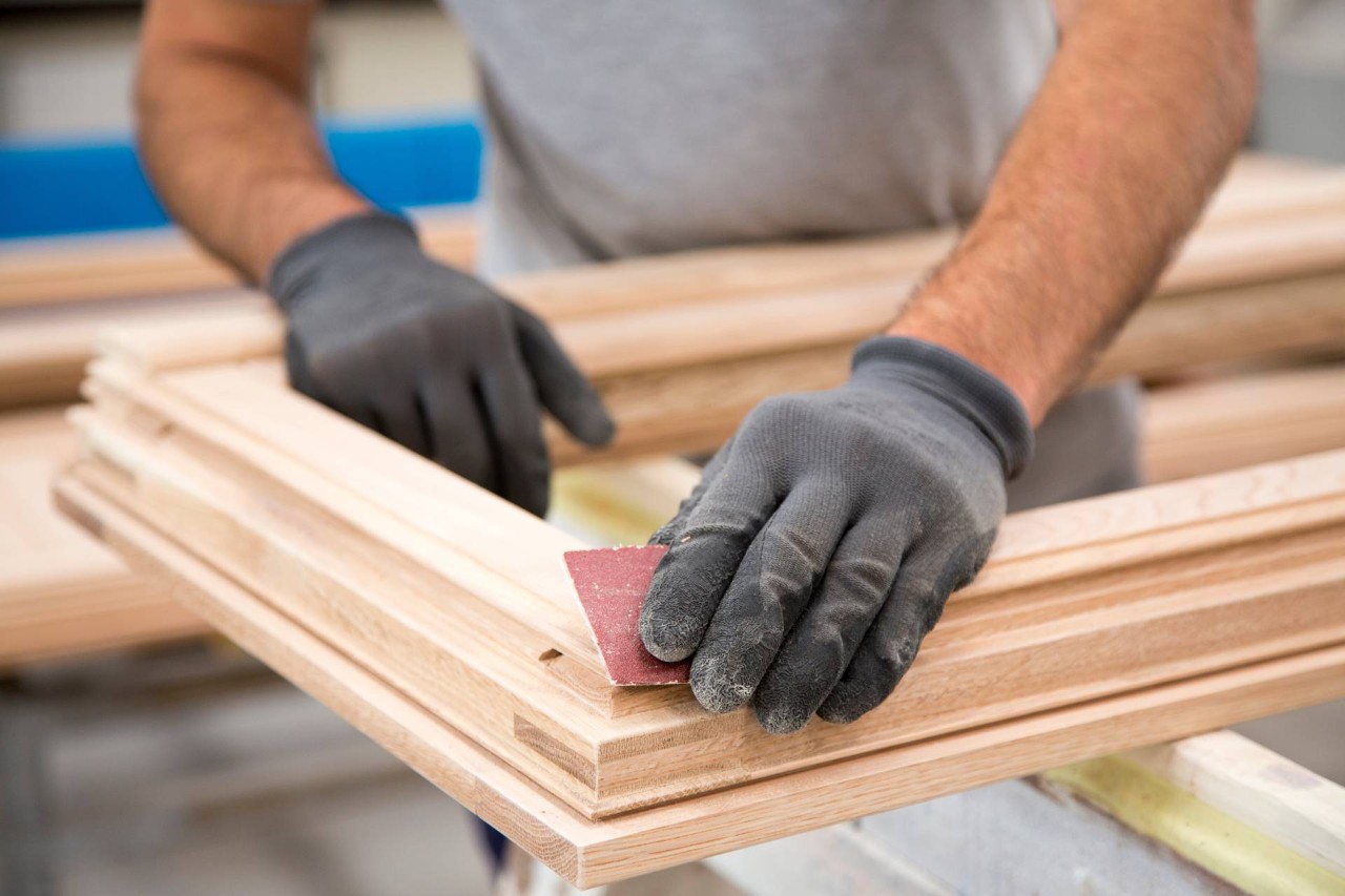 Someone working on a window cornice for a home near Cape Coral, Florida (FL)