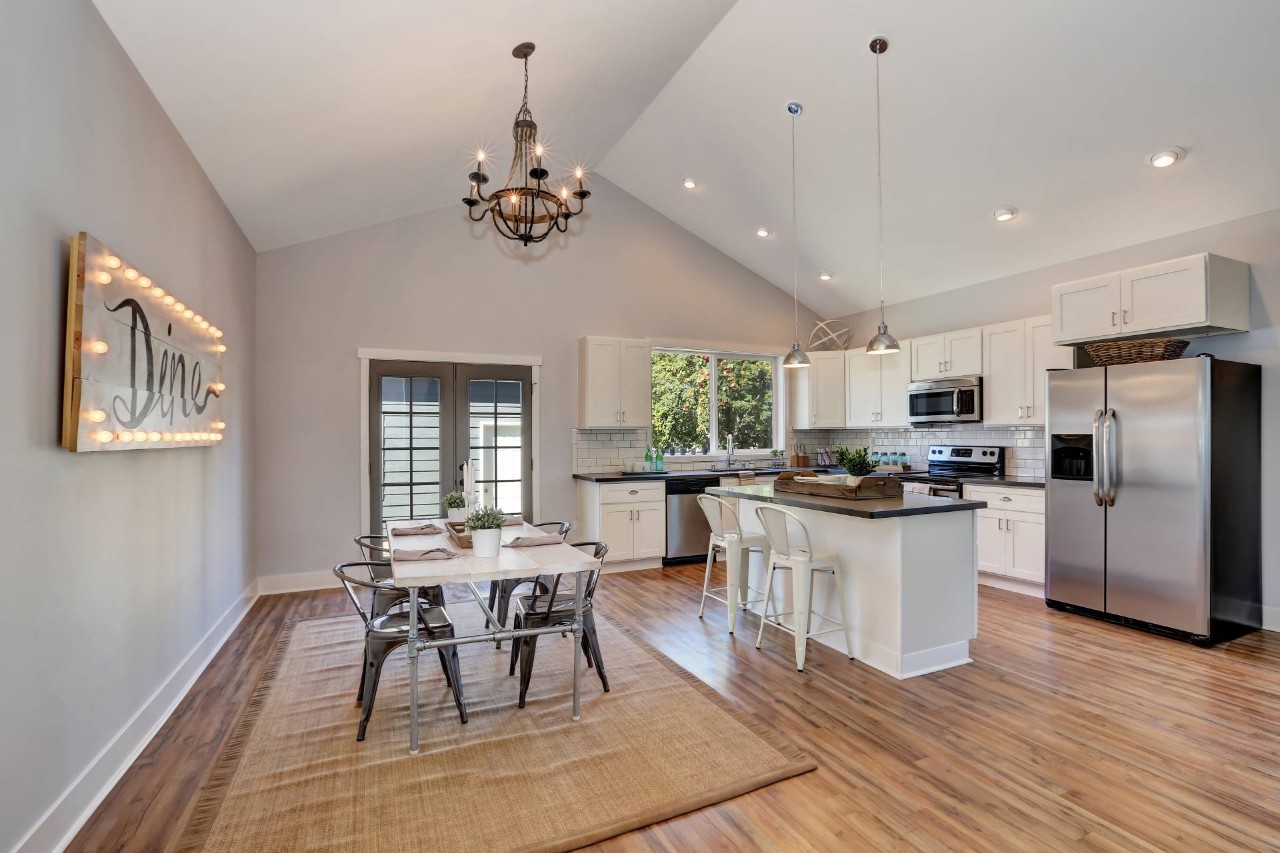 A dining room and kitchen combination in a modern style at Blind & Shutter Gallery near Cape Coral, FL